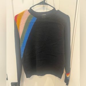 Black sweater with rainbow pattern